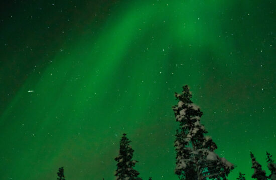 Northern Lights by Minivan in Levi