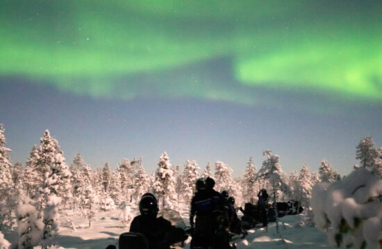 Northern Lights by Snowmobile in Levi