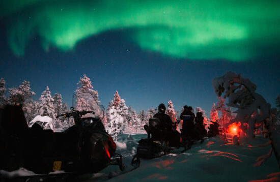 Northern Lights by Snowmobile in Levi